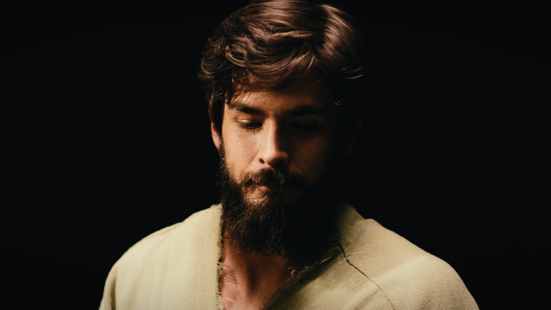 A cinematic still portraying St. Joseph